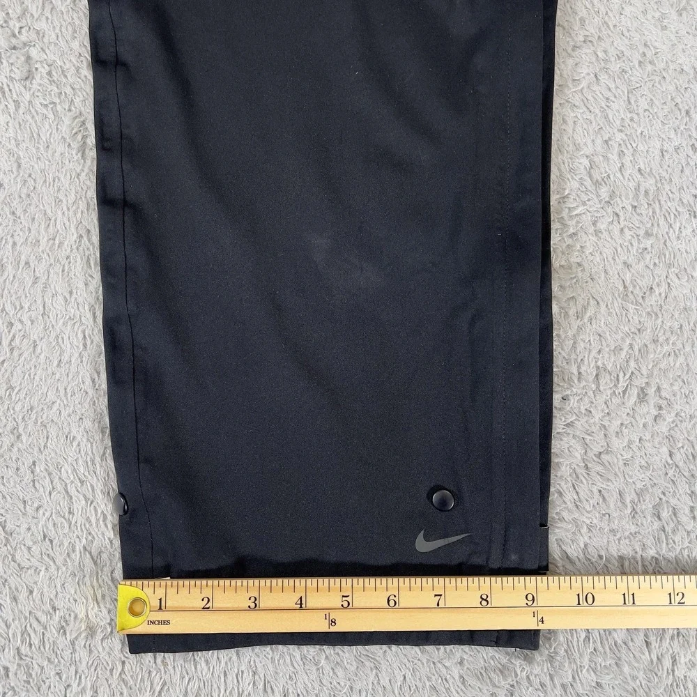 Nike Golf Storm Fit Rain Pants Mens L Black Waterproof Windproof Zip Cuff 267354